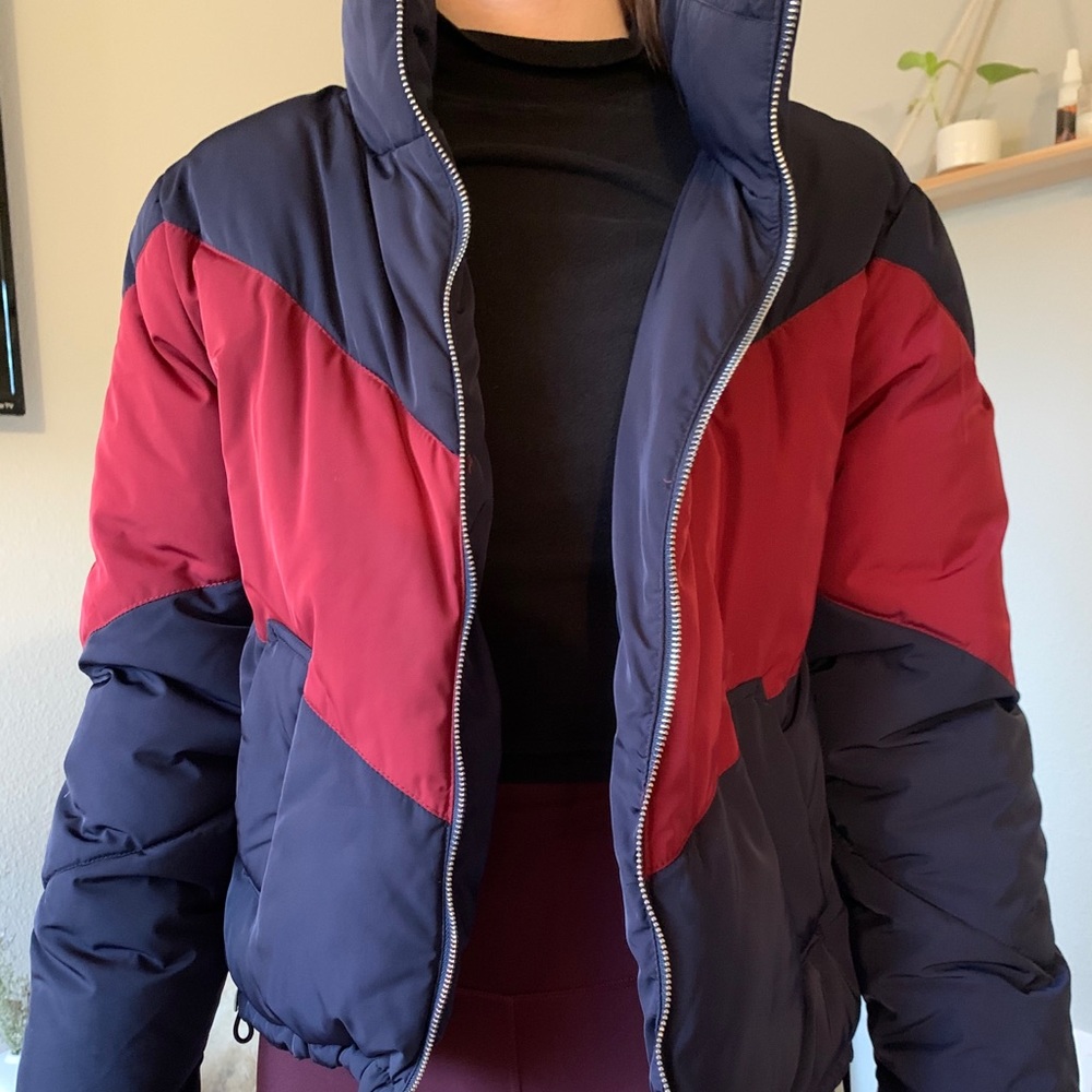 Red and blue puffer coat